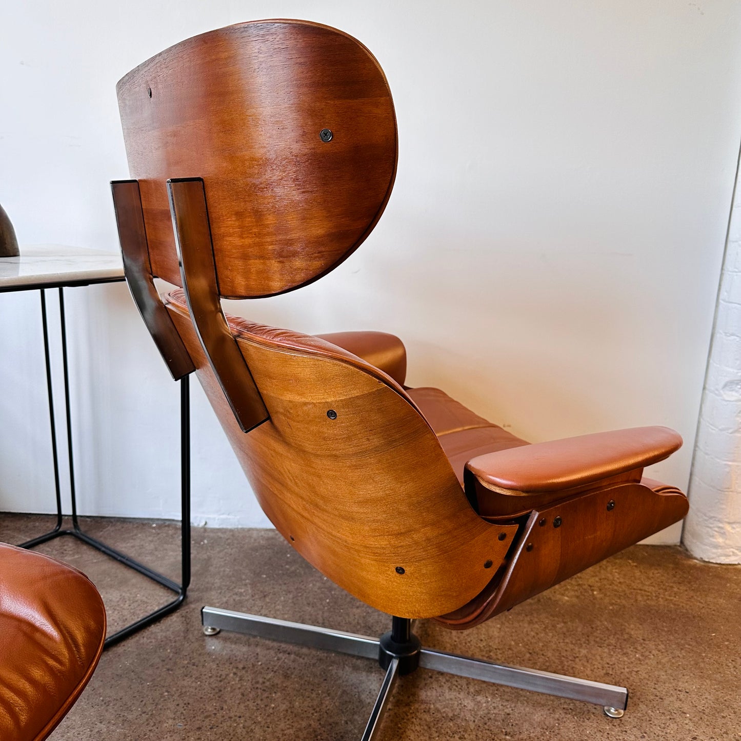 VINTAGE PLYCRAFT COGNAC AND WALNUT LOUNGE CHAIR AND OTTOMAN