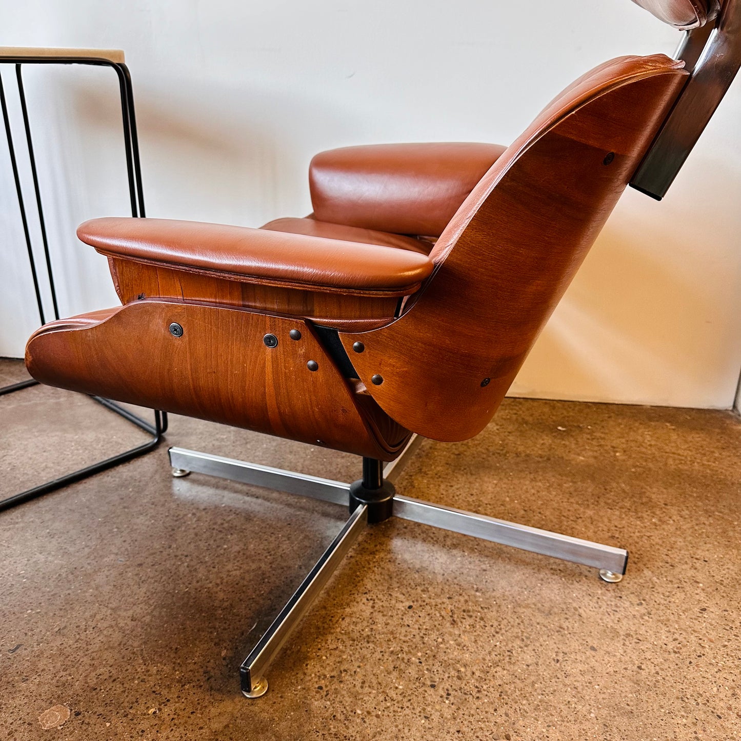 VINTAGE PLYCRAFT COGNAC AND WALNUT LOUNGE CHAIR AND OTTOMAN