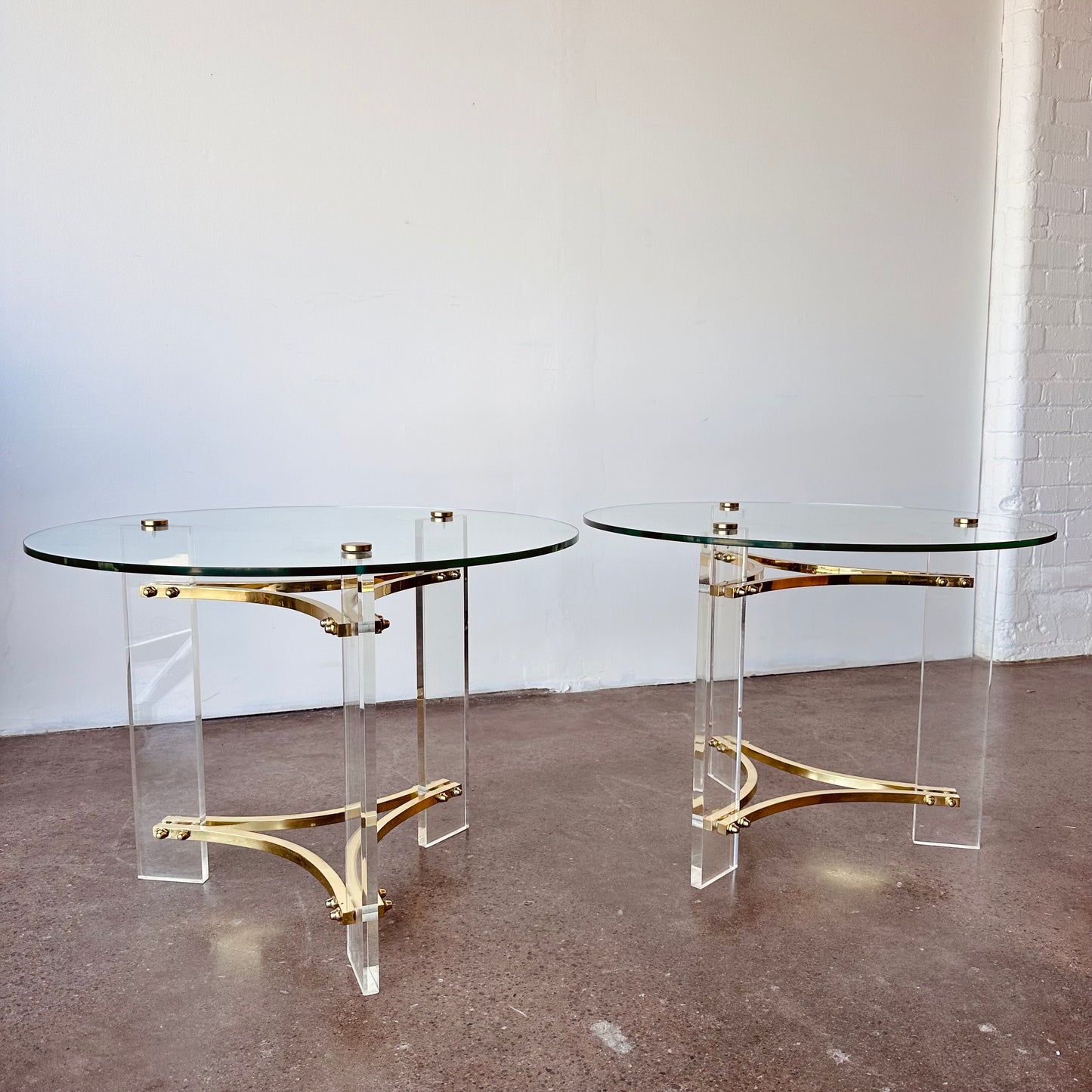 INTERLUDE GLASS, LUCITE, AND BRASS ACCENT TABLES