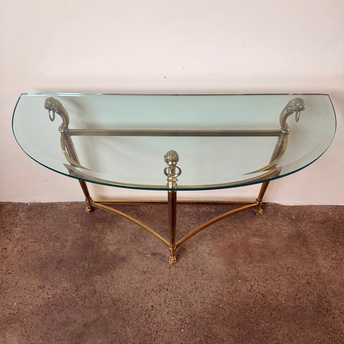 BRASS LABARGE DEMILUNE LION’S HEAD TABLE WITH GLASS