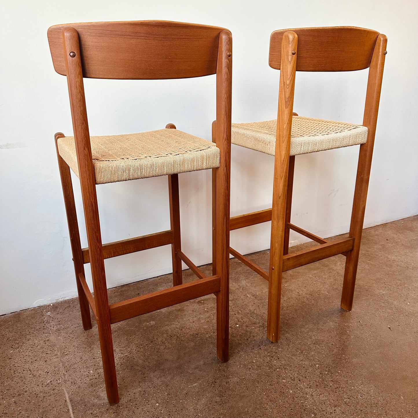 PAIR OF MODERN TEAK AND PAPER CORD BAR STOOLS