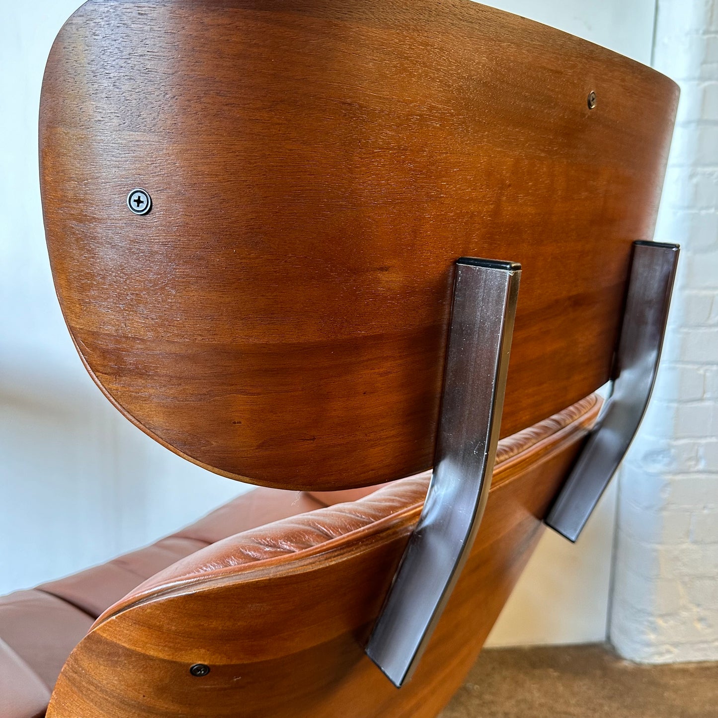 VINTAGE PLYCRAFT COGNAC AND WALNUT LOUNGE CHAIR AND OTTOMAN