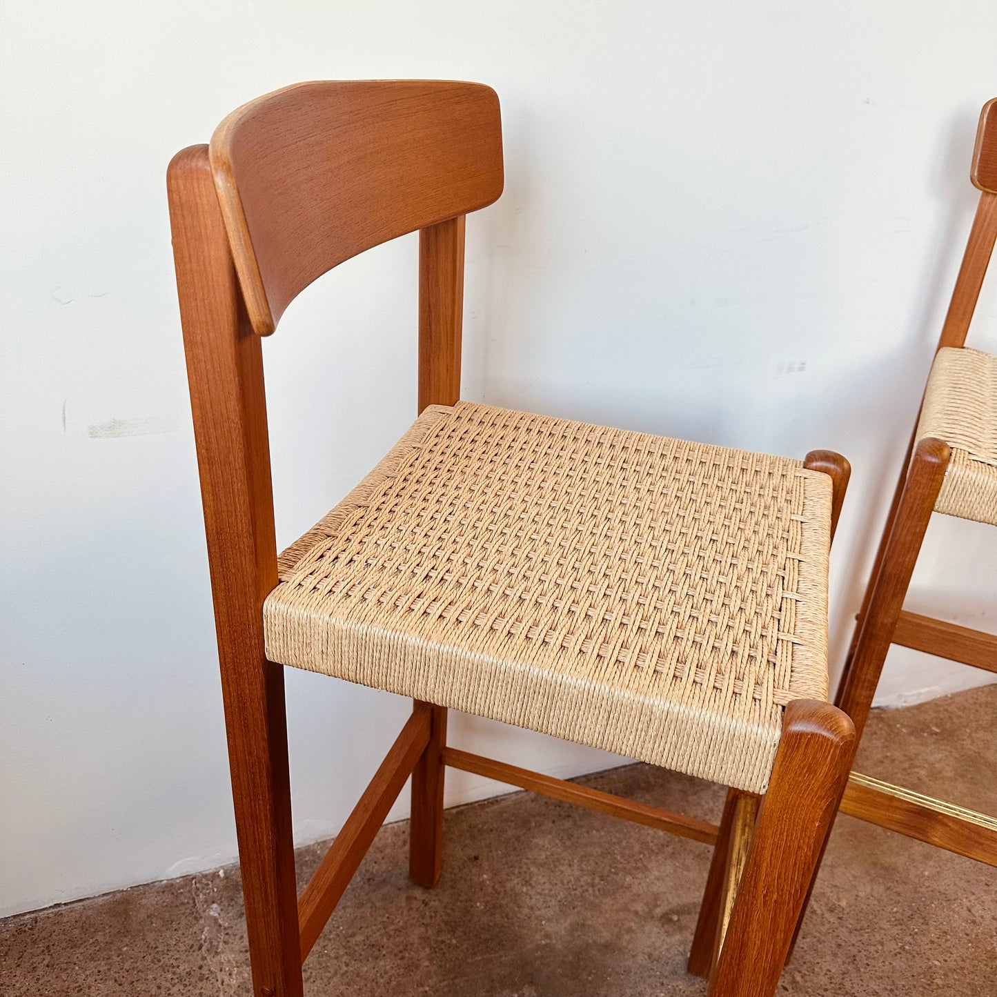 PAIR OF MODERN TEAK AND PAPER CORD BAR STOOLS
