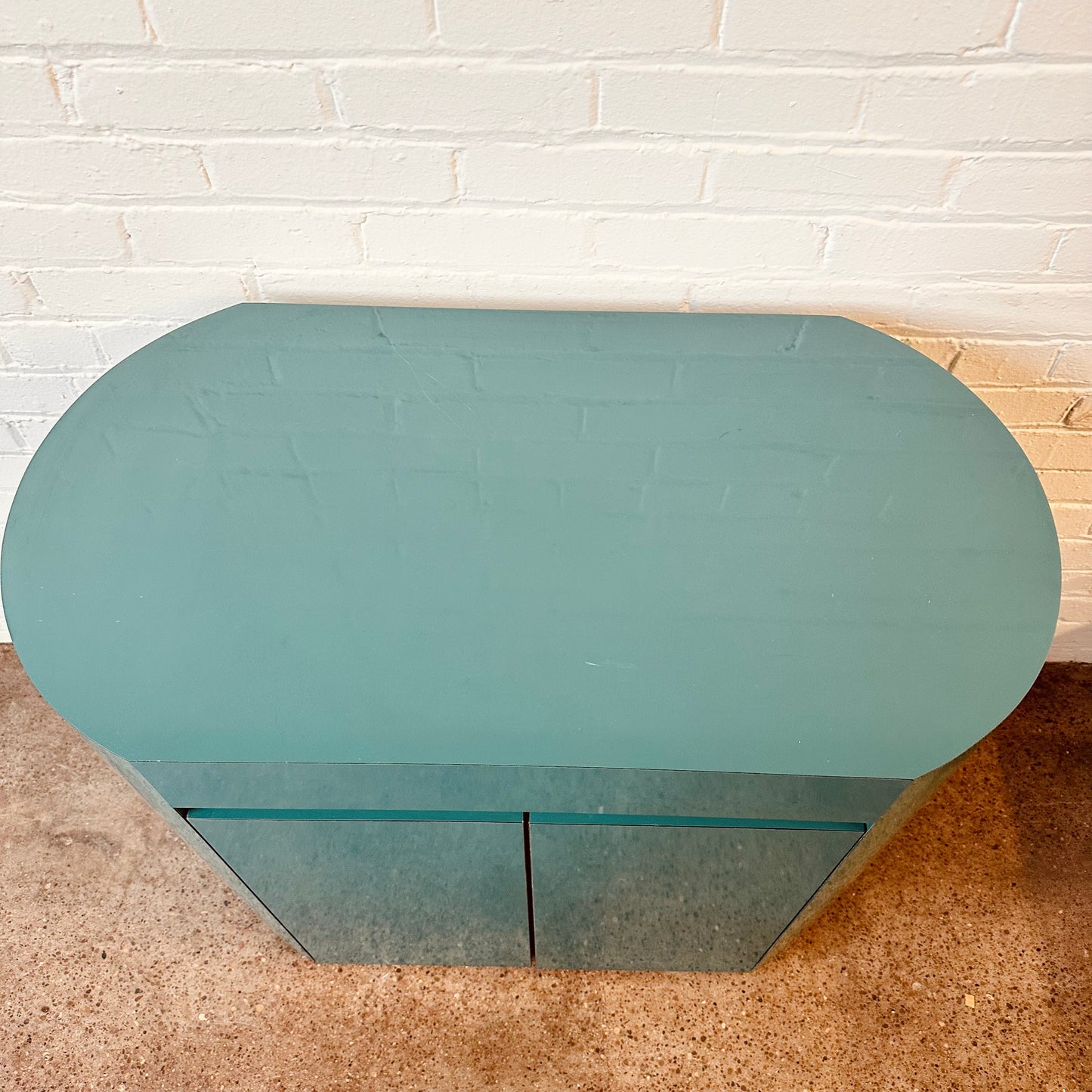 POST MODERN LACQUERED LAMINATE OVAL CABINET