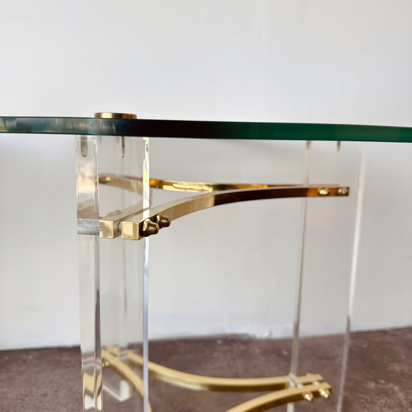 INTERLUDE GLASS, LUCITE, AND BRASS ACCENT TABLES