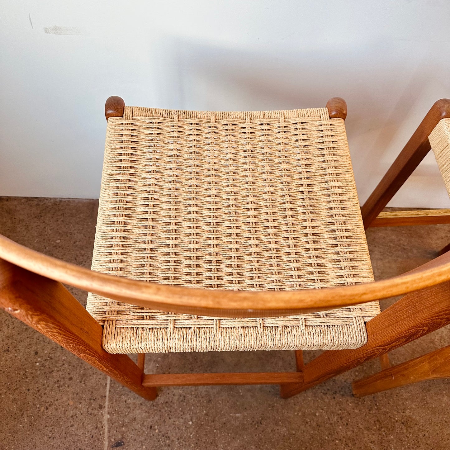 PAIR OF MODERN TEAK AND PAPER CORD BAR STOOLS