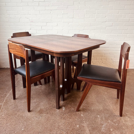 WALNUT DINING TABLE WITH SCULPTURAL BASE