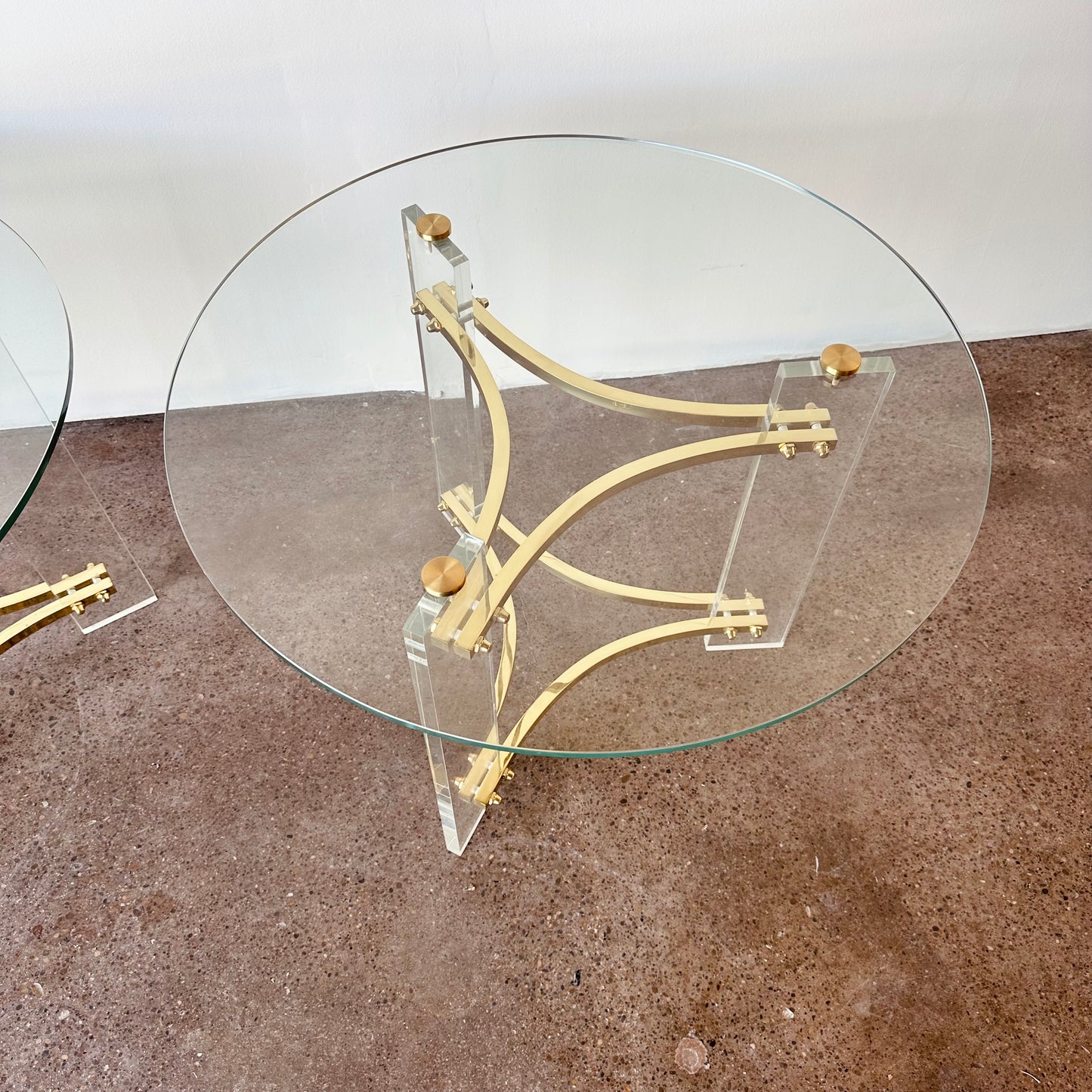 INTERLUDE GLASS, LUCITE, AND BRASS ACCENT TABLES