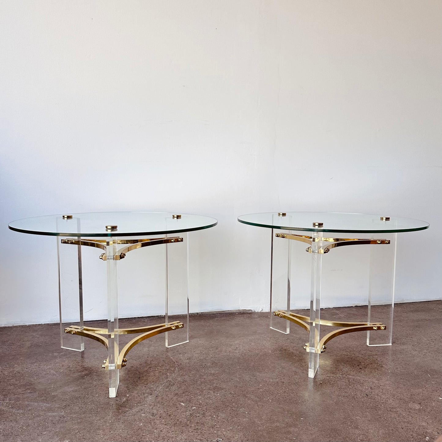 INTERLUDE GLASS, LUCITE, AND BRASS ACCENT TABLES