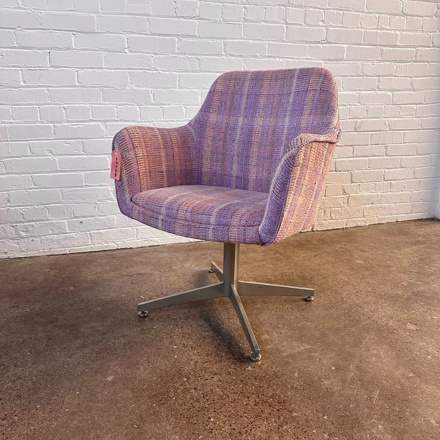 MCM PINK PLAID UPHOLSTERED SWIVEL CHAIR