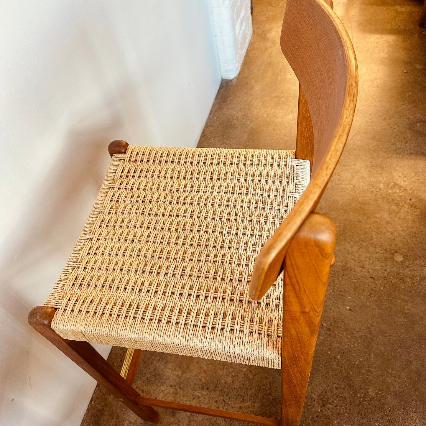 PAIR OF MODERN TEAK AND PAPER CORD BAR STOOLS