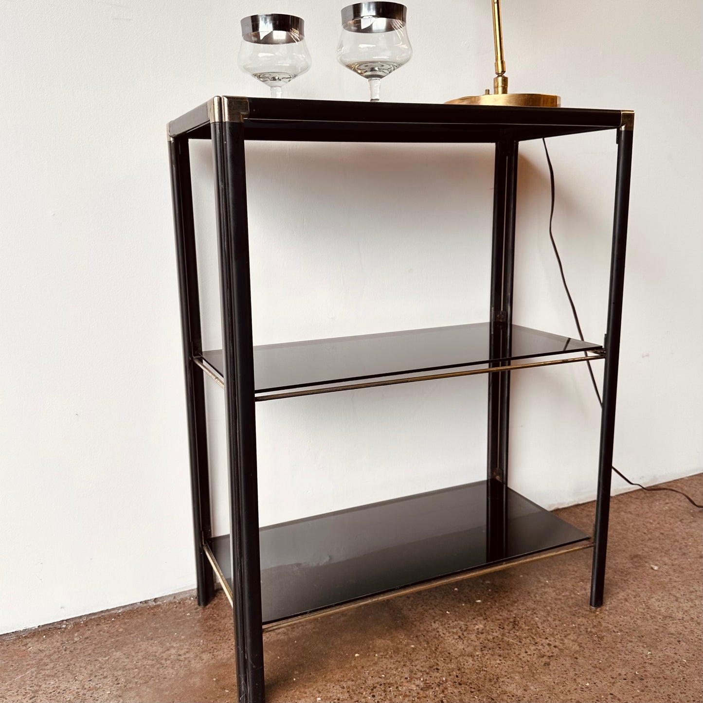 BLACK AND BRASS METAL SHELVE WITH SMOKE GLASS