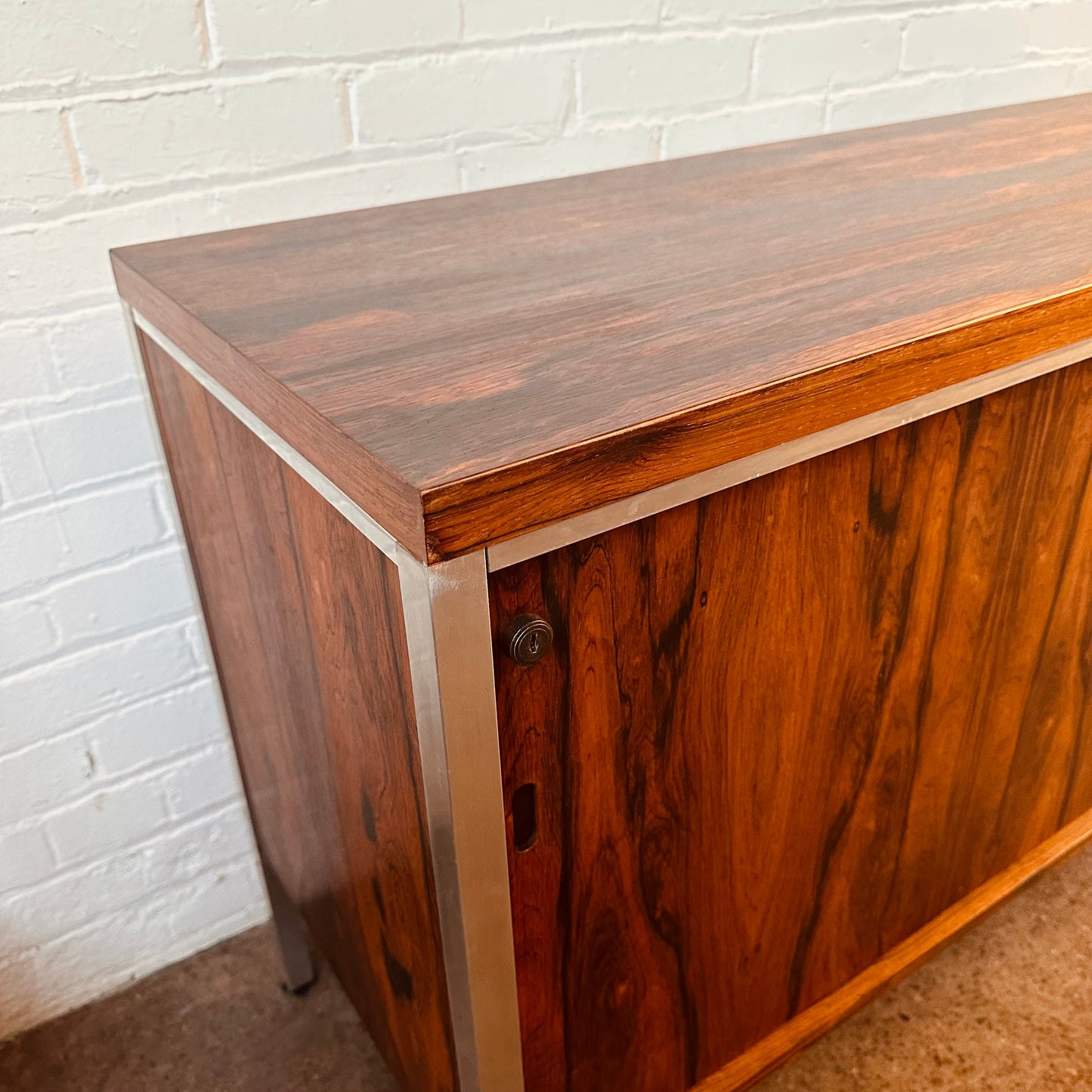 ROSEWOOD AND CHROME BYPASS DOOR CREDENZA