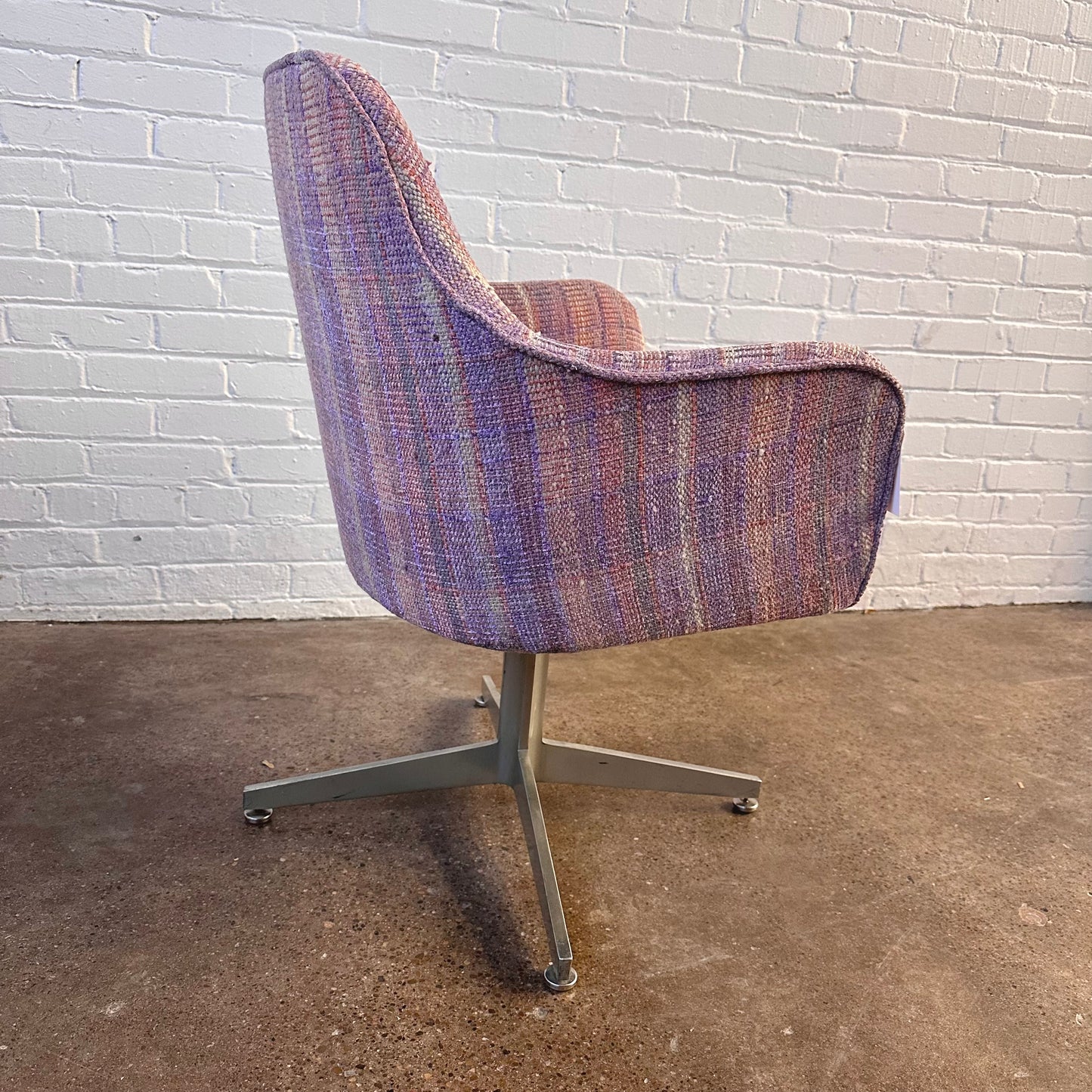 MCM PINK PLAID UPHOLSTERED SWIVEL CHAIR