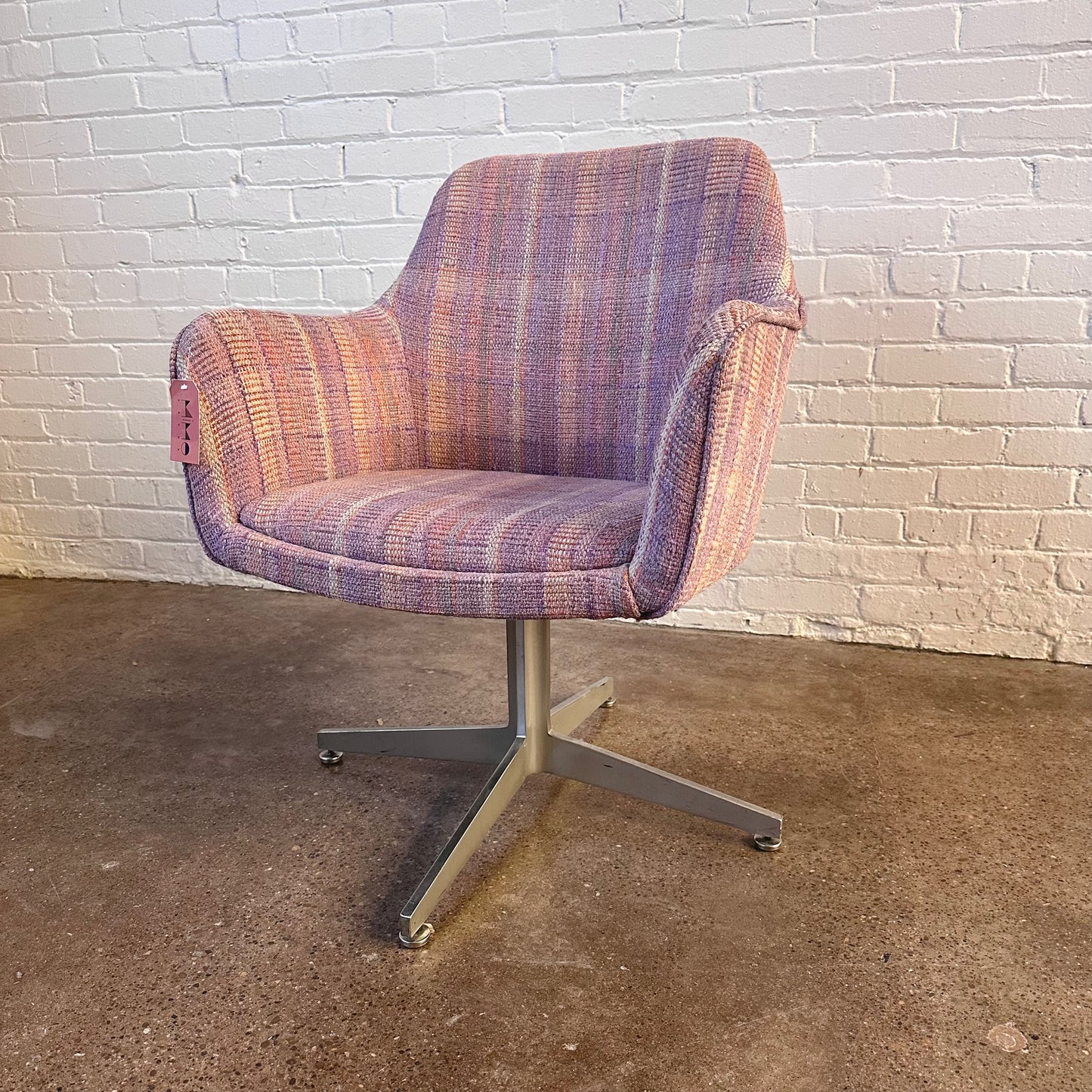 MCM PINK PLAID UPHOLSTERED SWIVEL CHAIR