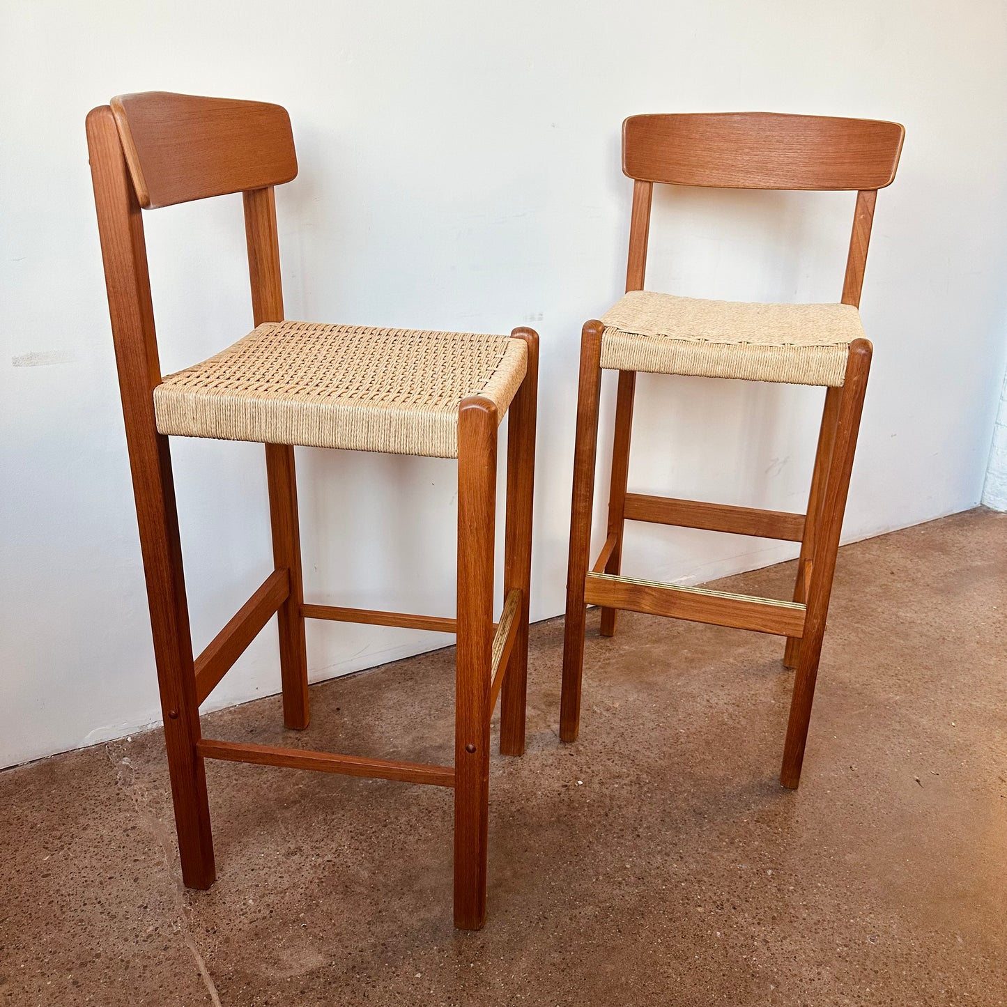 PAIR OF MODERN TEAK AND PAPER CORD BAR STOOLS