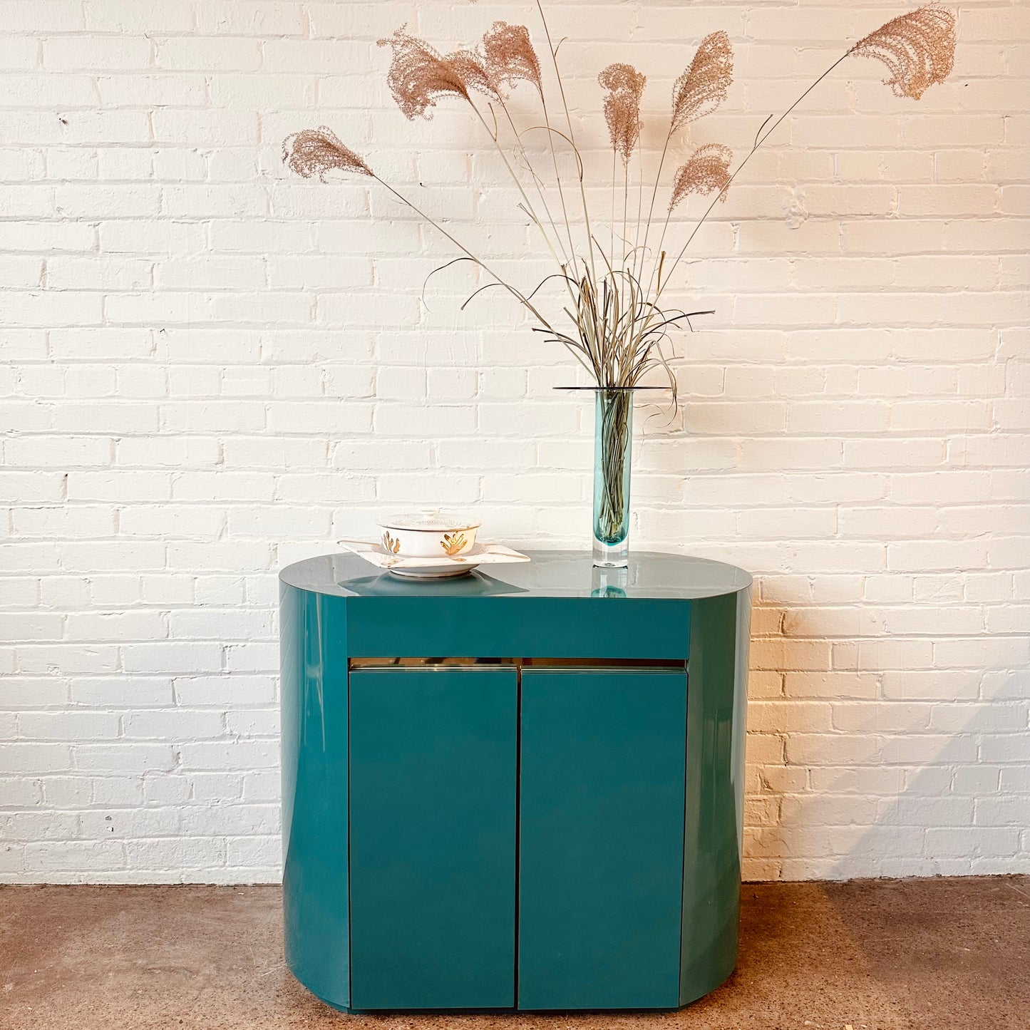 POST MODERN LACQUERED LAMINATE OVAL CABINET