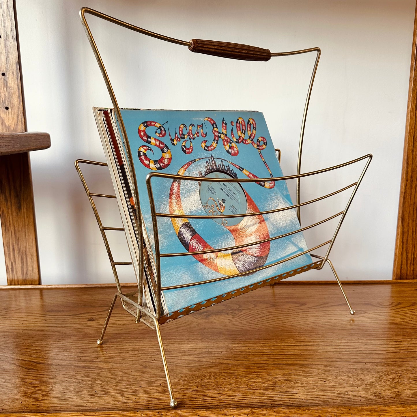 BRASS WIRE MAGAZINE RACK WITH WOOD HANDLE