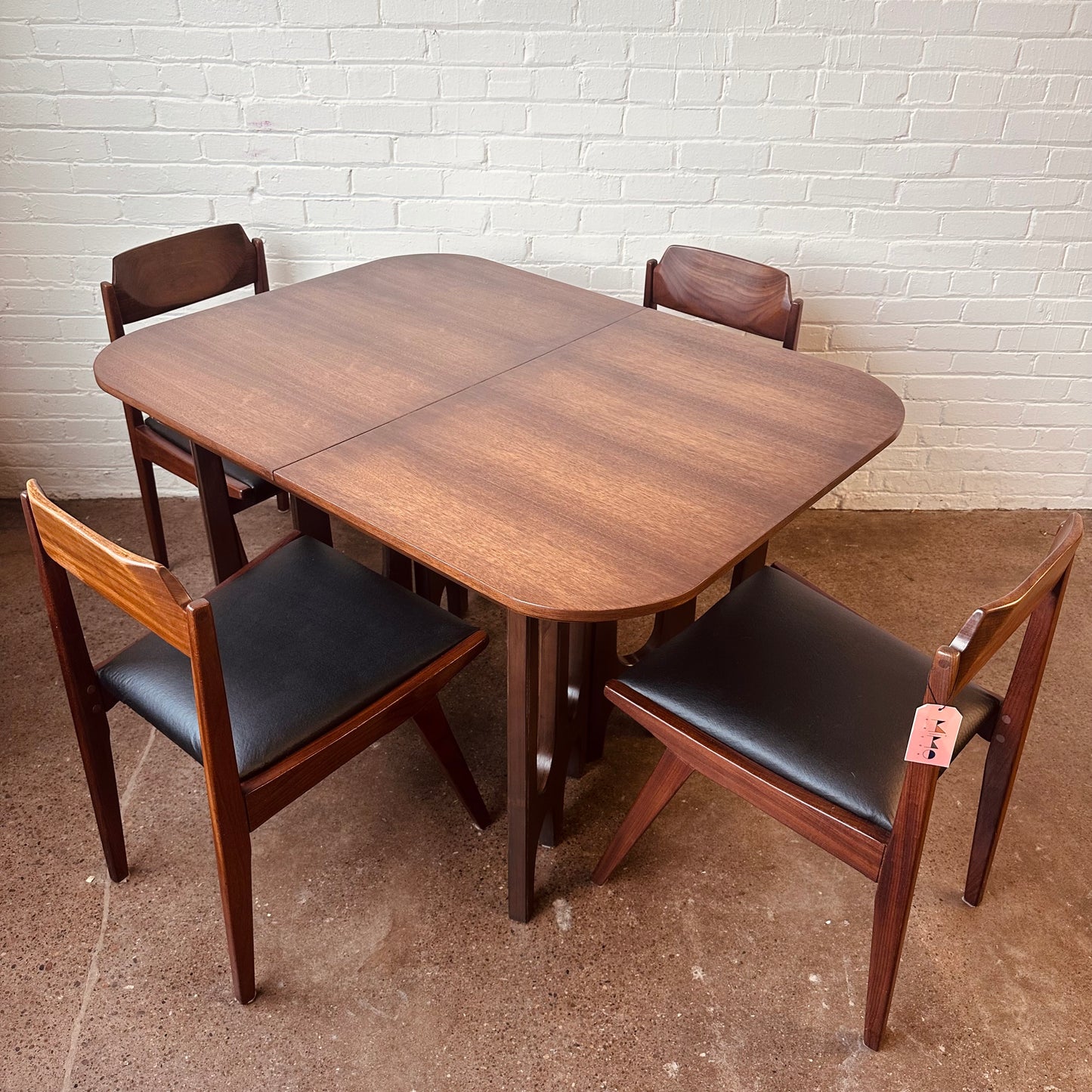 WALNUT DINING TABLE WITH SCULPTURAL BASE
