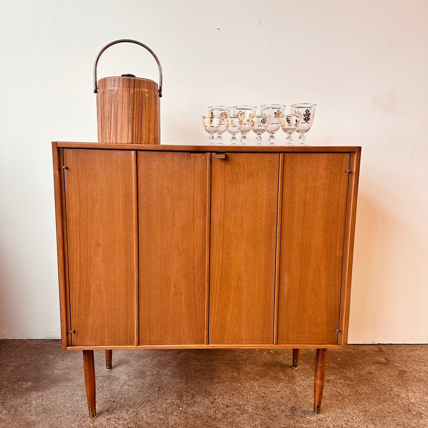 ACCORDION DOOR HONEY TONE BAR CABINET