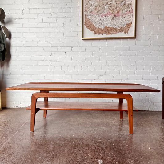 RESTORED DANISH TEAK COFFEE TABLE WITH SCULPTED LEGS