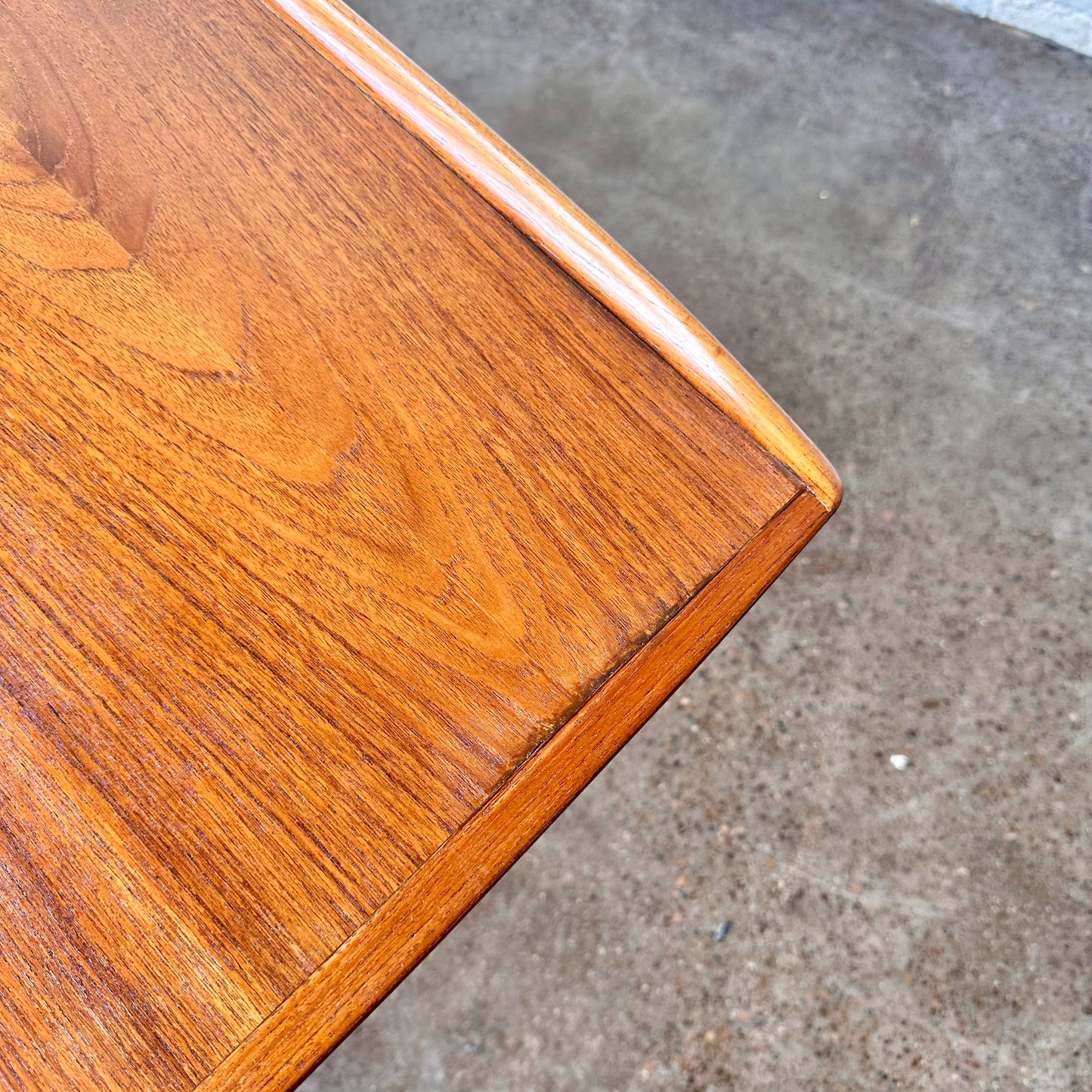 RESTORED DANISH TEAK COFFEE TABLE WITH SCULPTED LEGS