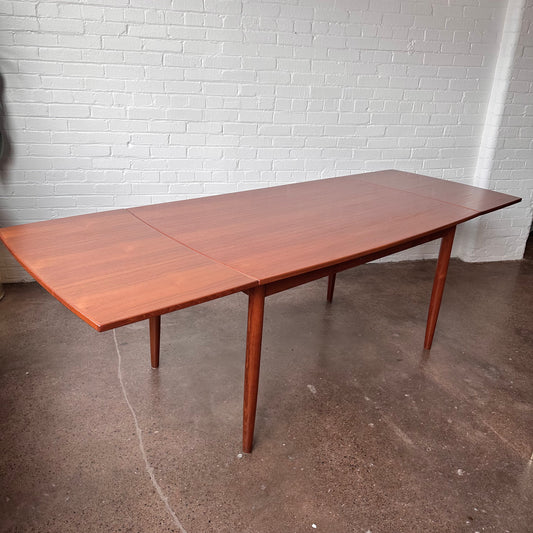 DANISH TEAK BOAT SHAPED DINING TABLE WITH DRAW LEAF