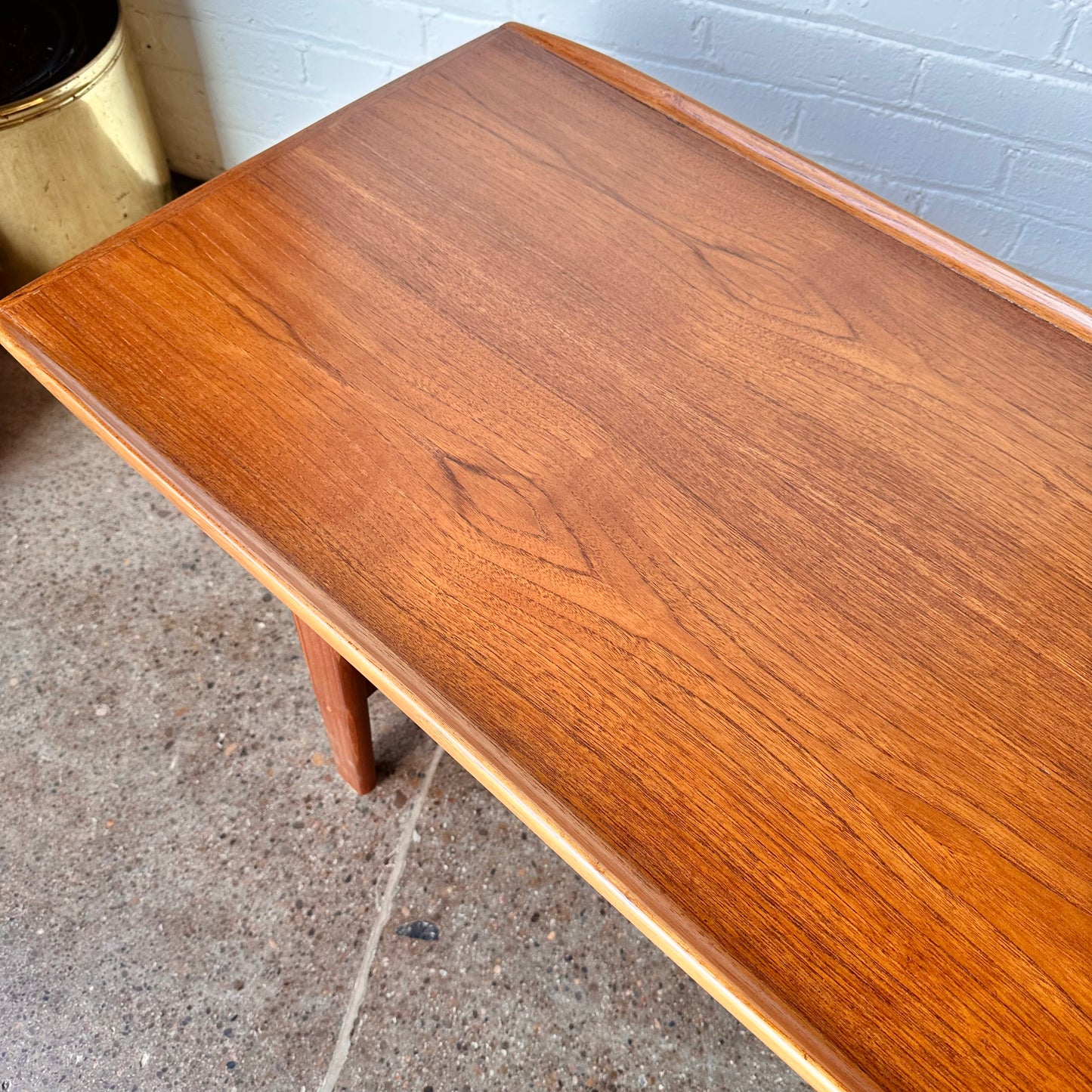 RESTORED DANISH TEAK COFFEE TABLE WITH SCULPTED LEGS