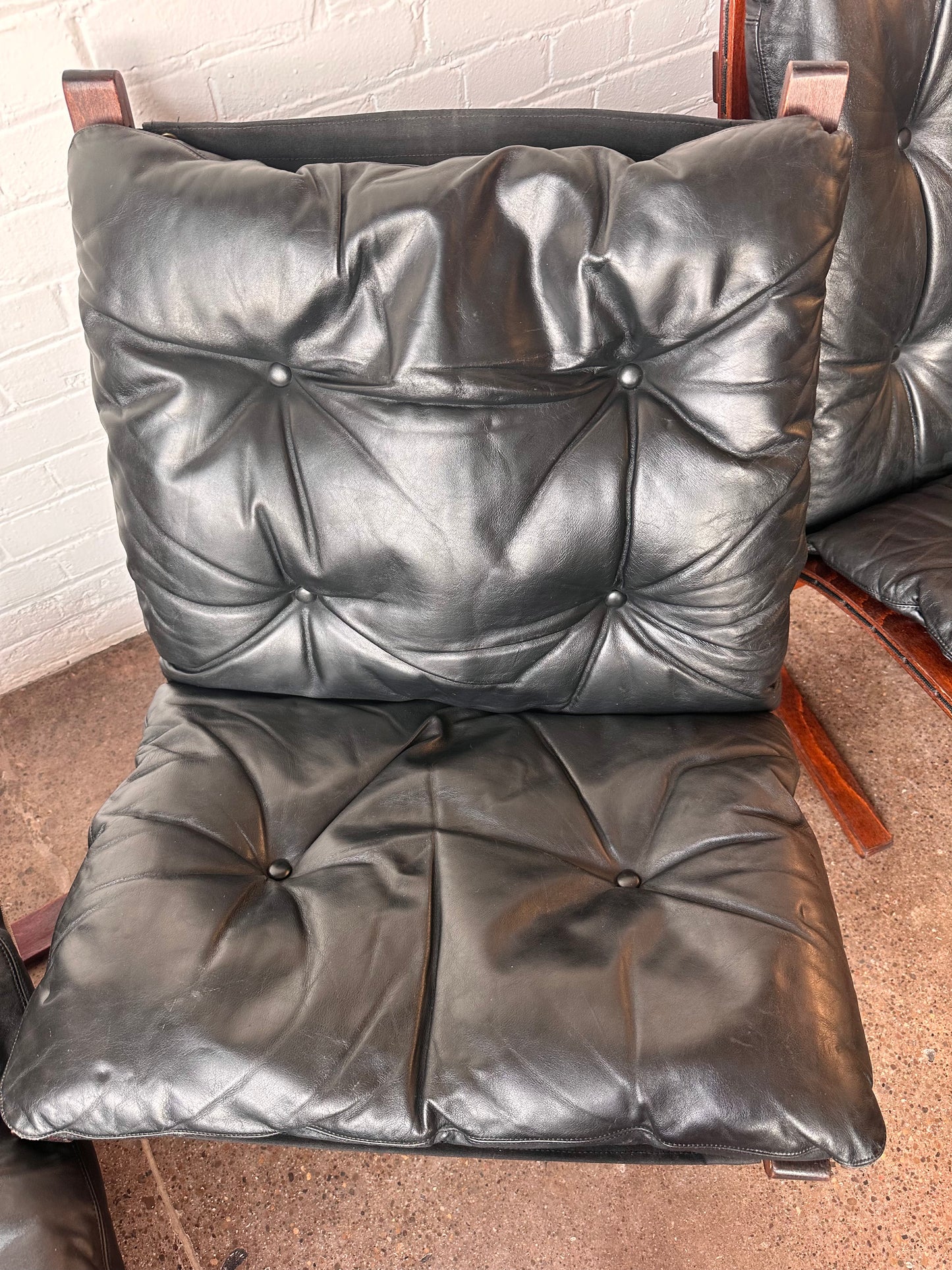 1960S BLACK LEATHER SIESTA LOUNGE CHAIR & OTTOMAN BY WESTNOFA