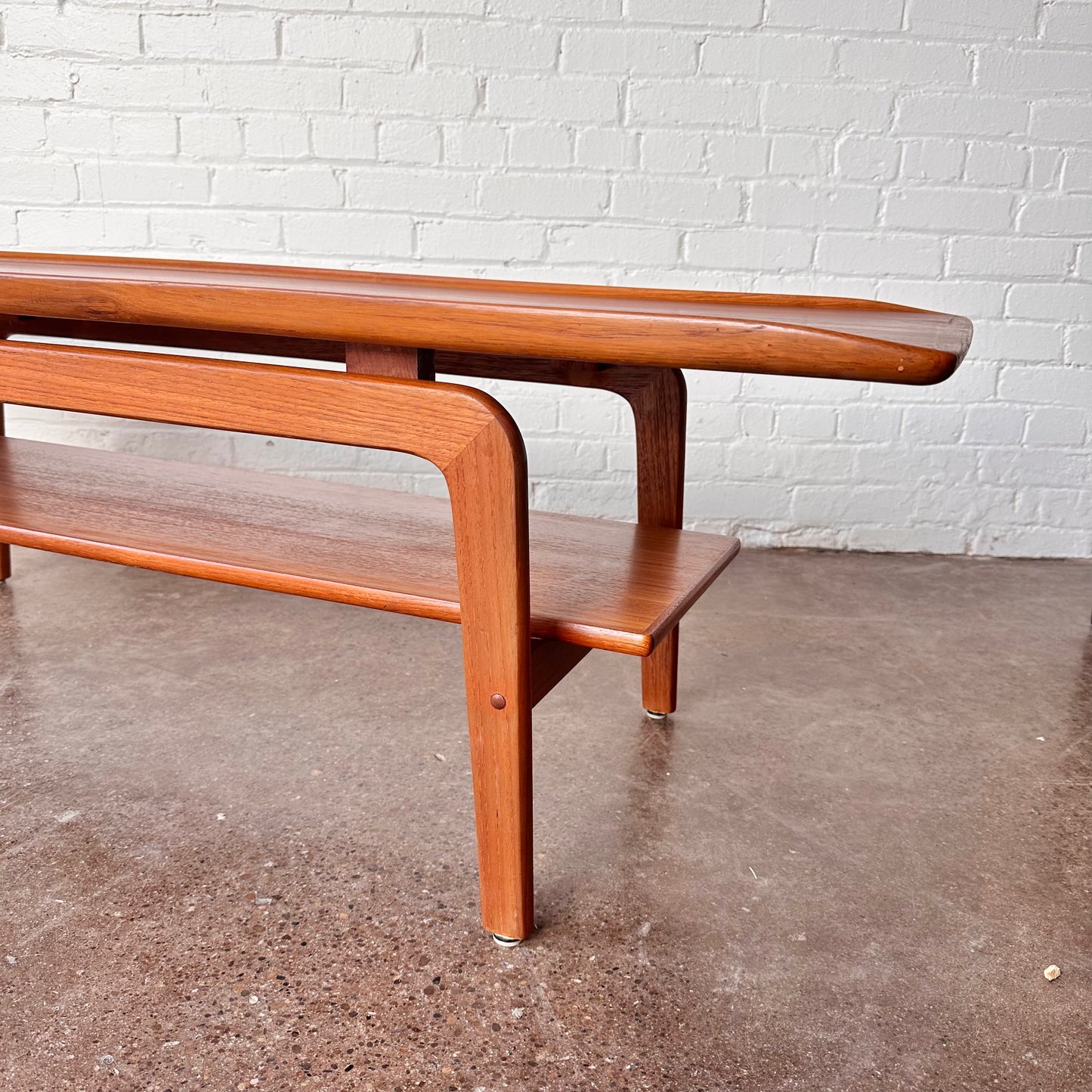 RESTORED DANISH TEAK COFFEE TABLE WITH SCULPTED LEGS
