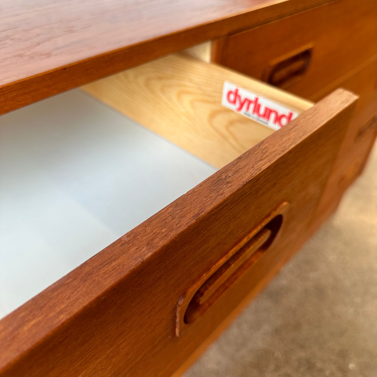 DYRLUND TEAK DRESSER WITH EIGHT DRAWERS