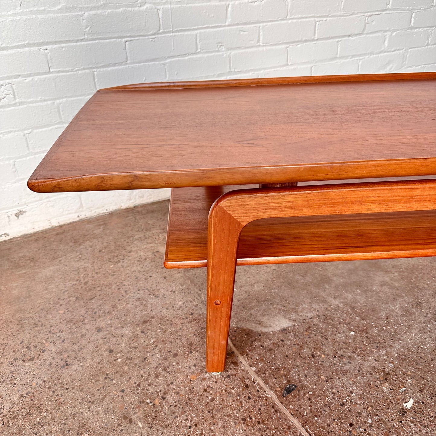 RESTORED DANISH TEAK COFFEE TABLE WITH SCULPTED LEGS
