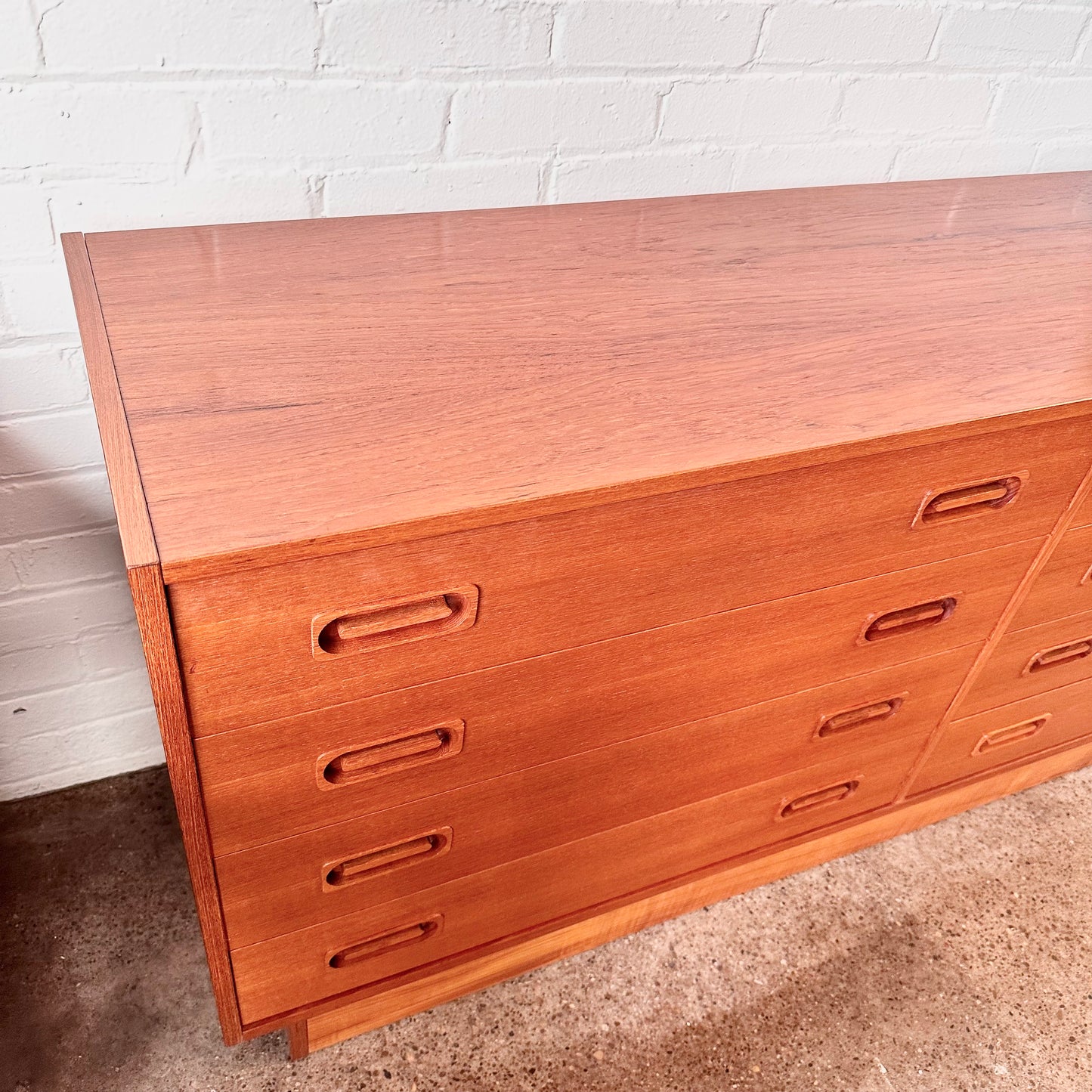 DYRLUND TEAK DRESSER WITH EIGHT DRAWERS