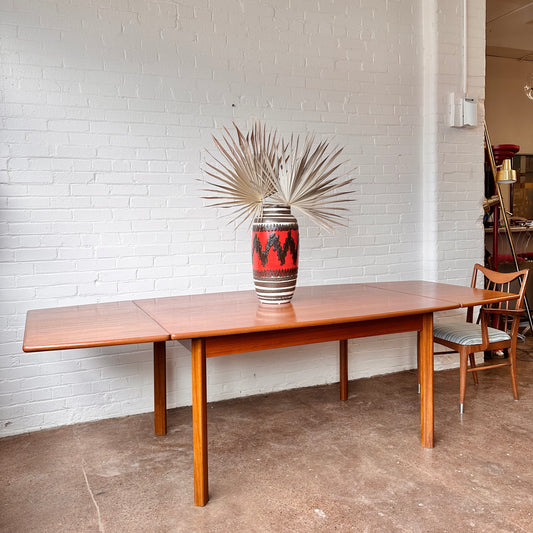 RESTORED BOAT-SHAPE TEAK DINING TABLE WITH EXTENSIONS