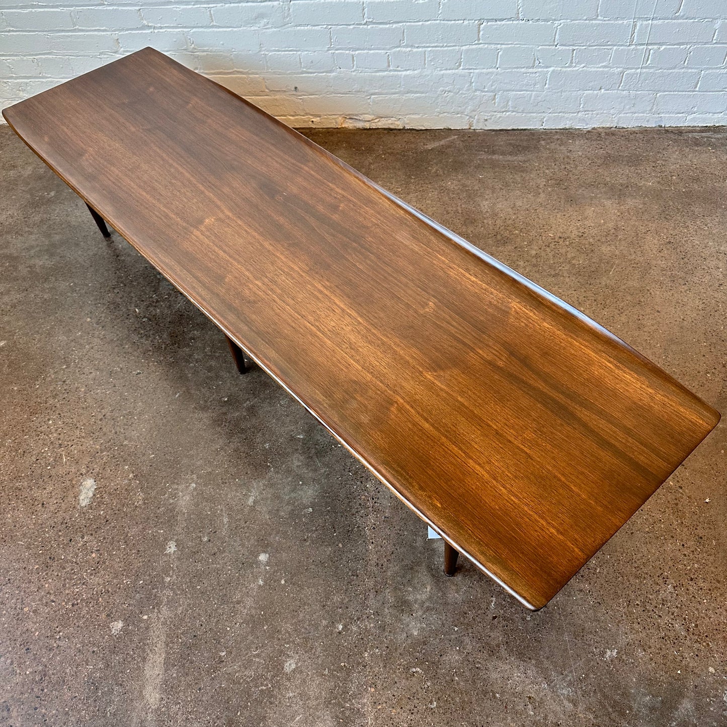BLACK WALNUT SURFBOARD-INSPIRED COFFEE TABLE