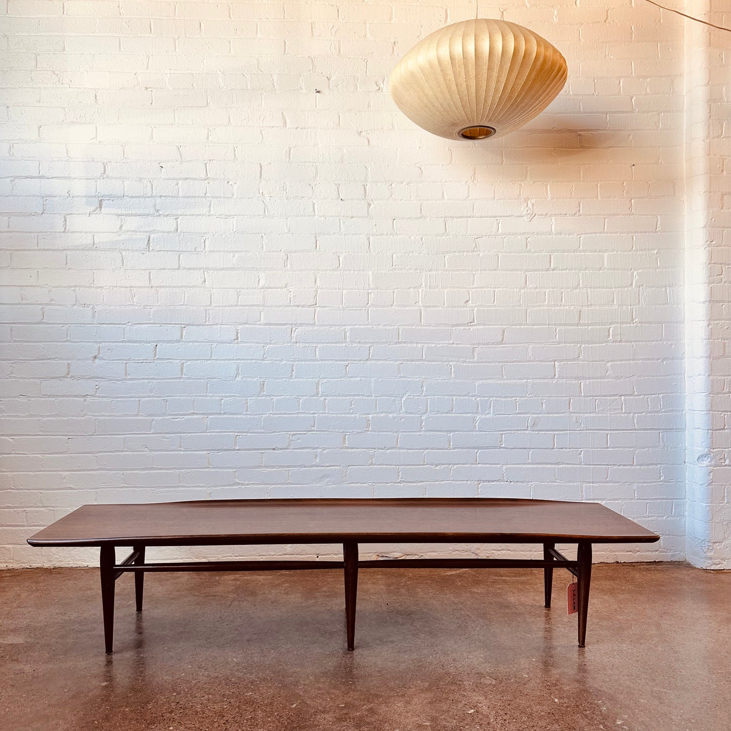 BLACK WALNUT SURFBOARD-INSPIRED COFFEE TABLE