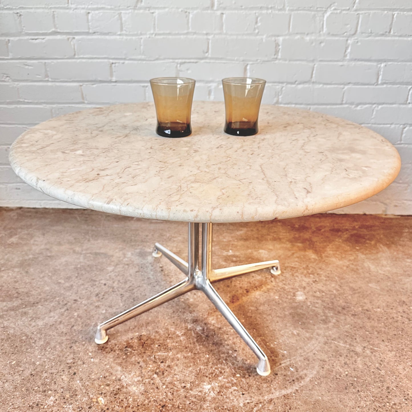 EAMES LA FONDA ROUND STONE COFFEE TABLE BY HERMAN MILLER