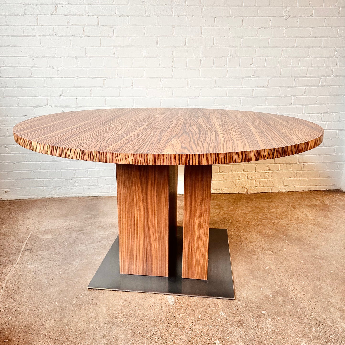 MODERN ROUND ZEBRA WOOD DINING TABLE WITH STEEL BASE