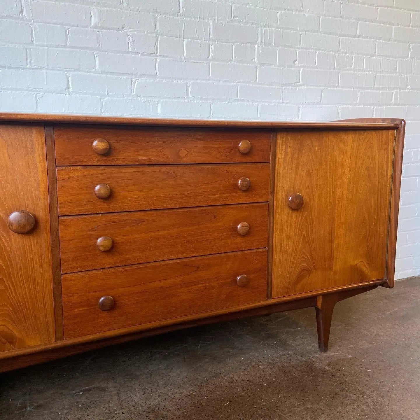 A YOUNGER CREDENZA IN AFROMOSIA & TEAK BY JOHN HUBERT