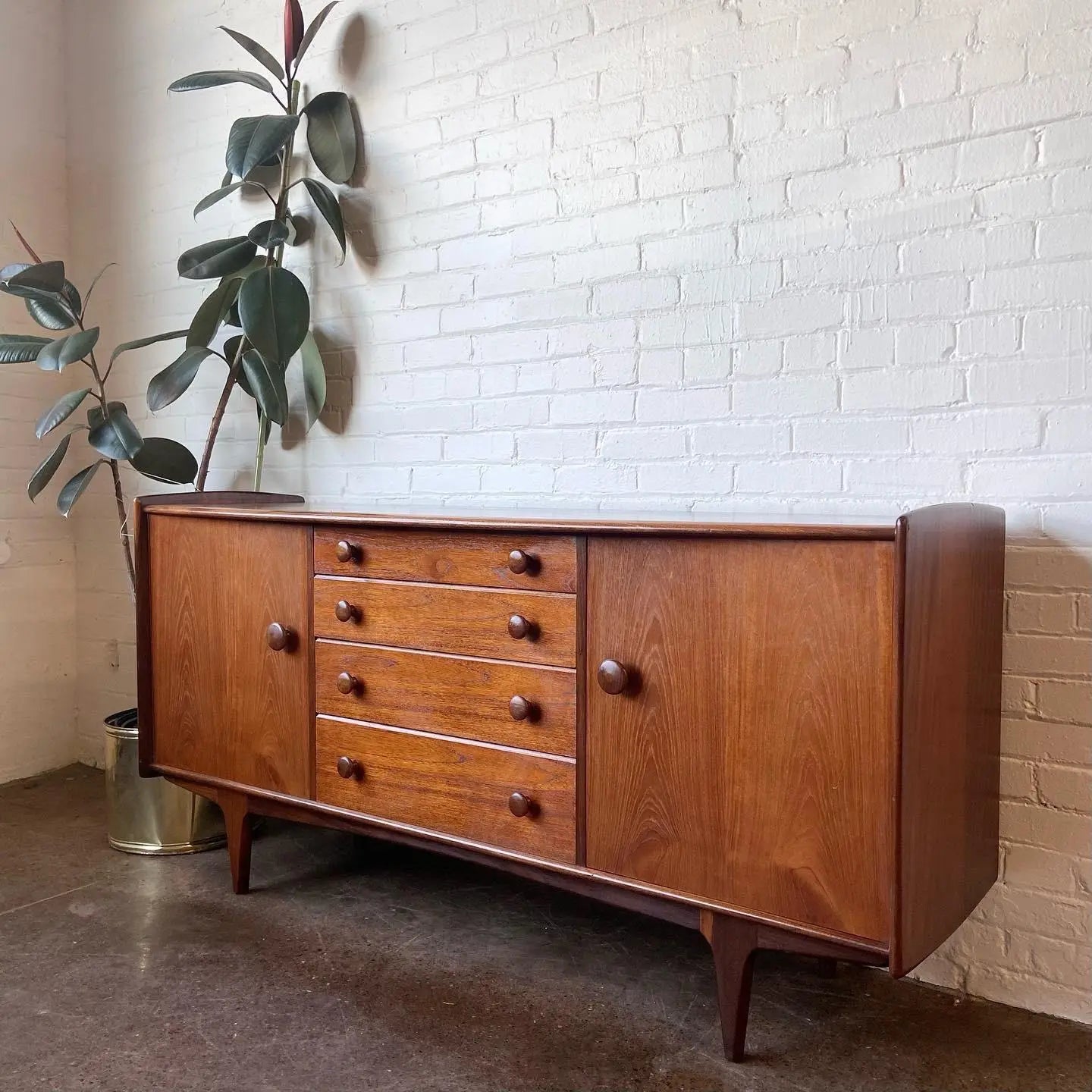 A YOUNGER CREDENZA IN AFROMOSIA & TEAK BY JOHN HUBERT
