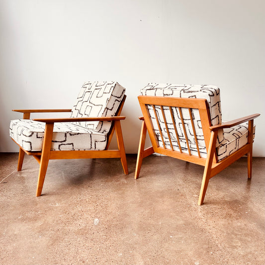 MID-CENTURY EUROPEAN OAK FRAMED ARM CHAIRS - A PAIR