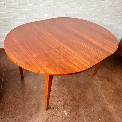 DANISH TEAK ROUND TO OVAL DINING TABLE WITH LEAF - RESTORED