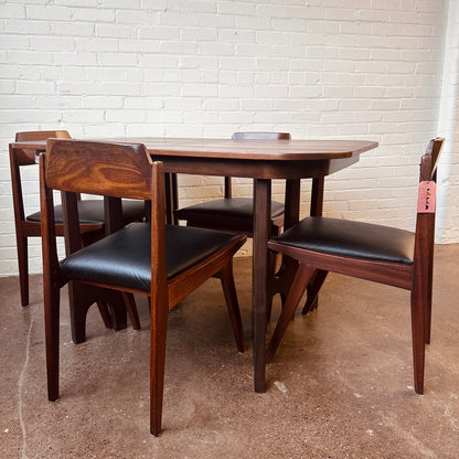 WALNUT DINING TABLE WITH SCULPTURAL BASE