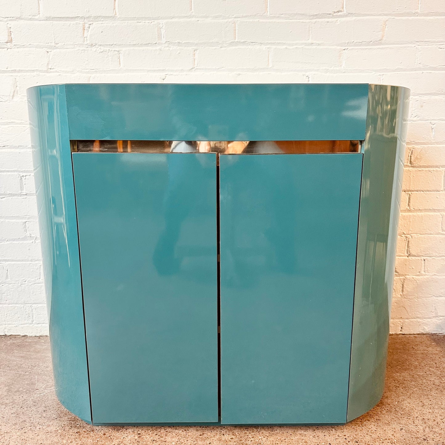 POST MODERN LACQUERED LAMINATE OVAL CABINET