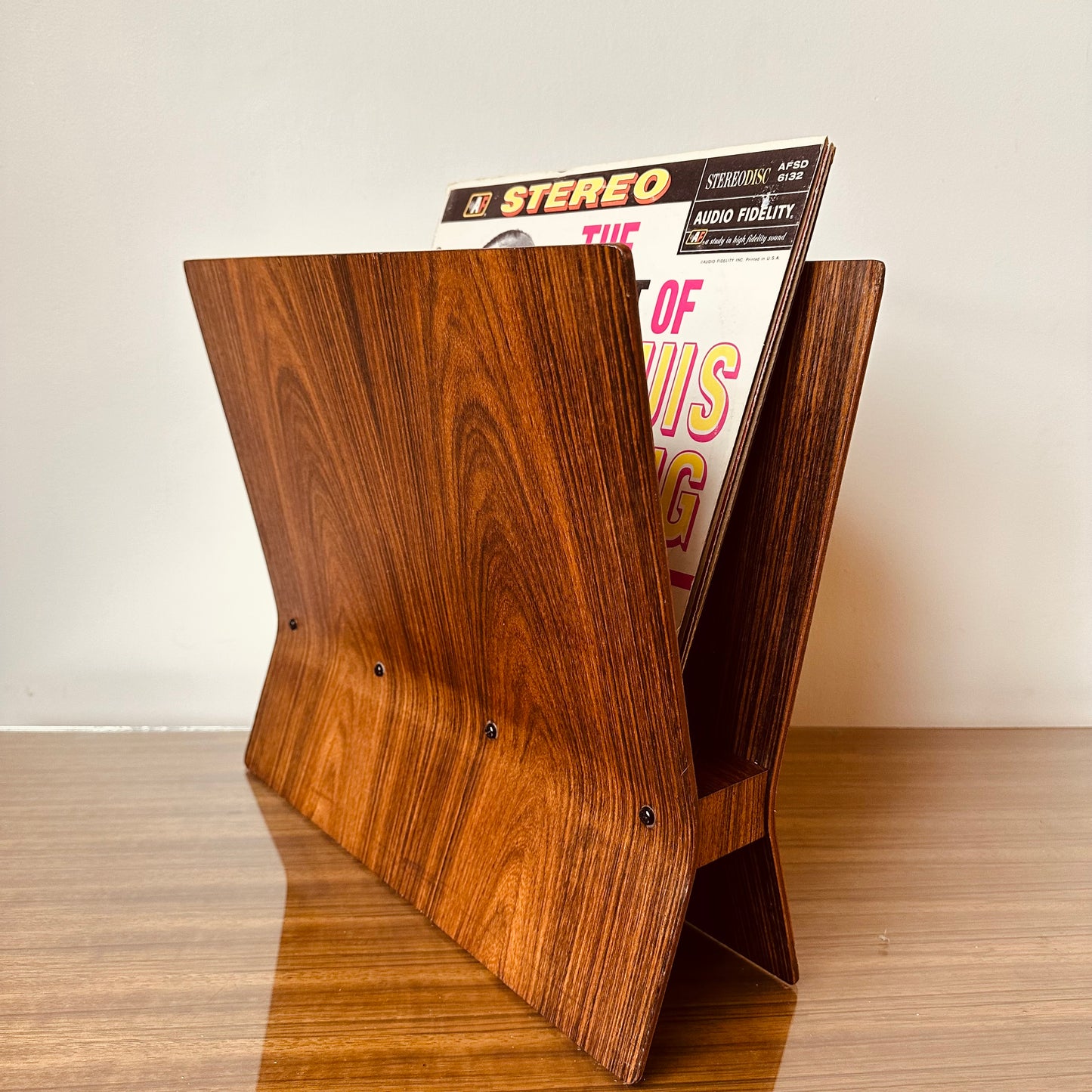 ROSEWOOD MAGAZINE RACK IN THE MANNER OF ALVAR AALTO