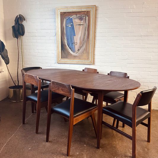 MID-CENTURY WALNUT OVAL DINING TABLE