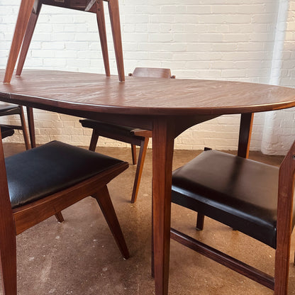 MID-CENTURY WALNUT OVAL DINING TABLE