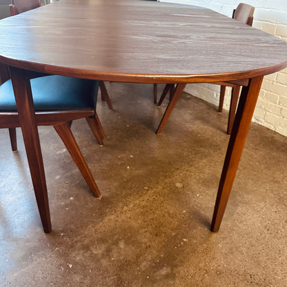 MID-CENTURY WALNUT OVAL DINING TABLE