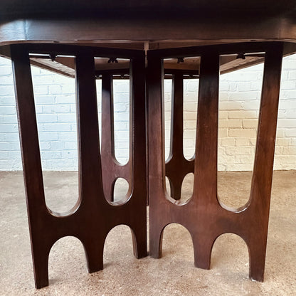 WALNUT DINING TABLE WITH SCULPTURAL BASE
