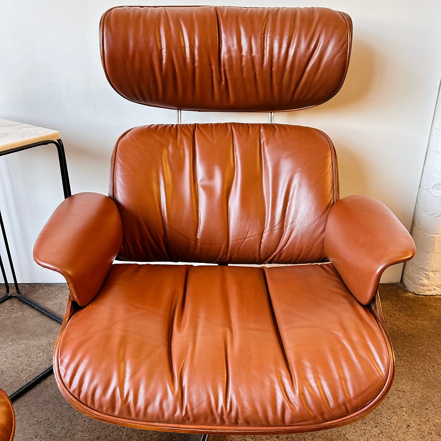 VINTAGE PLYCRAFT COGNAC AND WALNUT LOUNGE CHAIR AND OTTOMAN